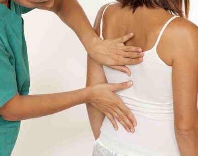 A patient who complains of pain in the shoulder blades on both sides is seen by a doctor